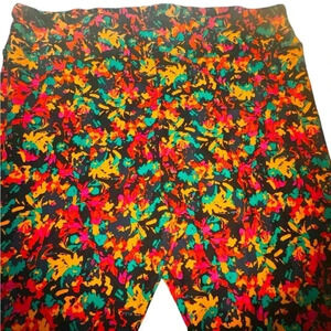 Lularoe TC2 orange & black floral leggings .OG designer Patrick quality & fit.